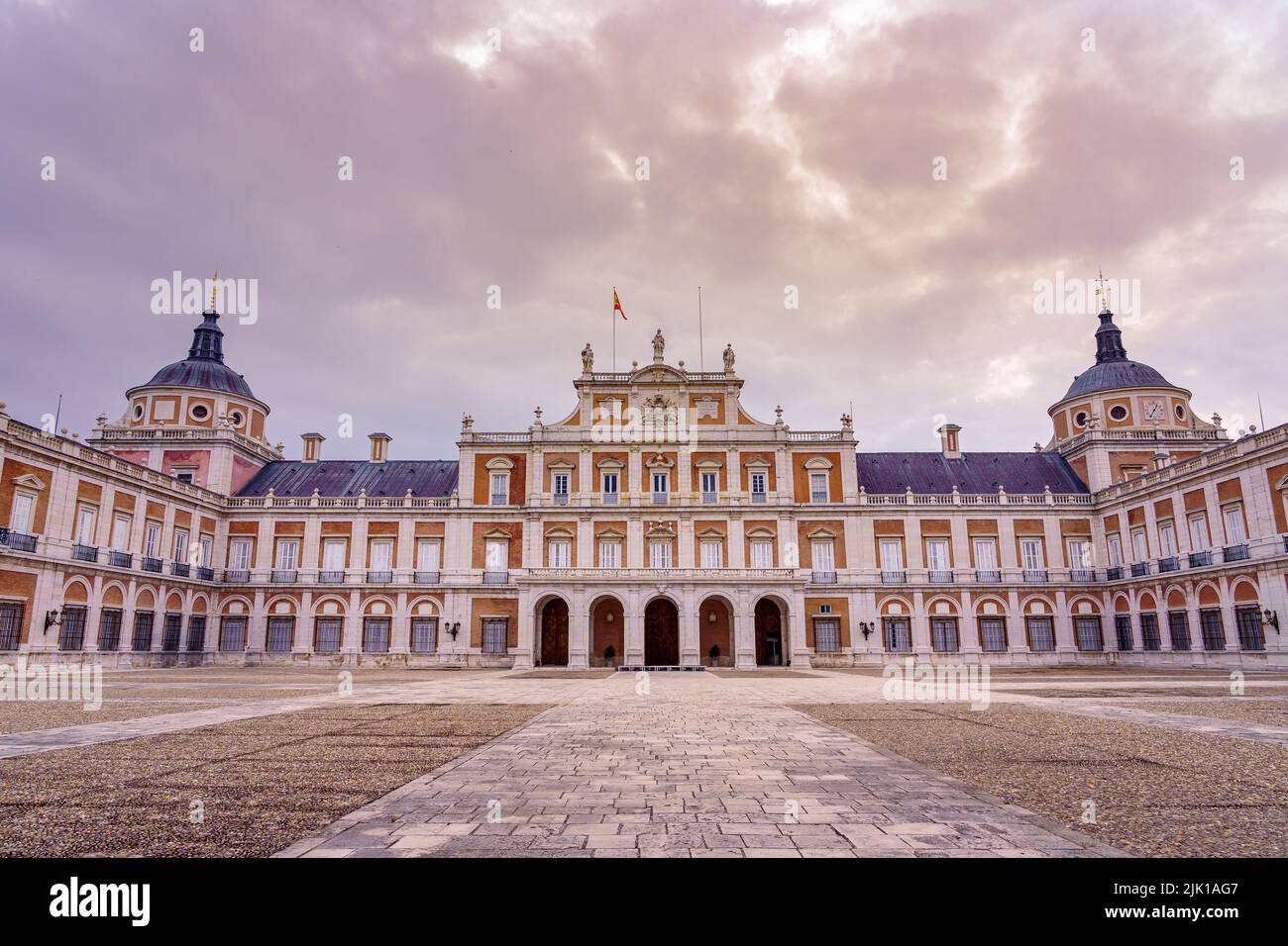 Main facade of the royal palace of Aranjuez with its rows of windows and two domes. Madrid Spain. Stock Photo