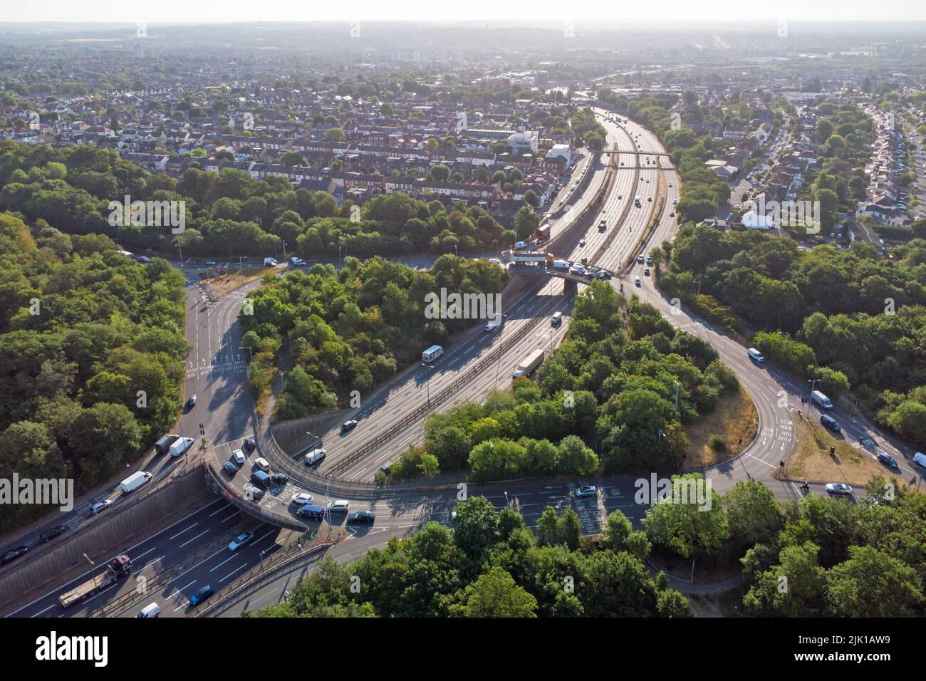 Waterworks roundabout in Walthamstow. A large roundabout with the A406 dual carriageway passing underneath in the morning sun surrounded by the forest Stock Photo