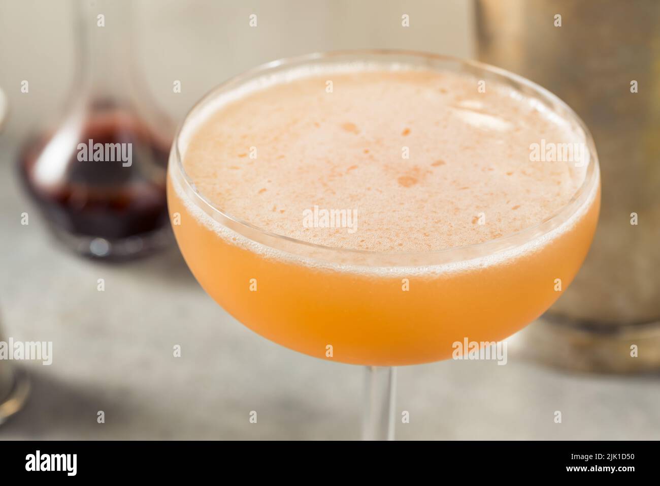 Boozy Refreshing Allspice Bourbon Lions Tail Cocktail in a Coupe Stock