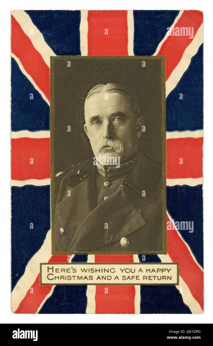 Original WW1 era wartime moral boosting postcard sent to fighting troops, 'Here's wishing you a happy Christmas and a safe return', it depicts a Union Jack with a portrait of Field Marshal John Denton Pinkstone French, 1st Earl of Ypres (1852-1925) in military uniform -  Photo by Reginald Haines, dated circa 1915, printed in London, U.K. Stock Photo