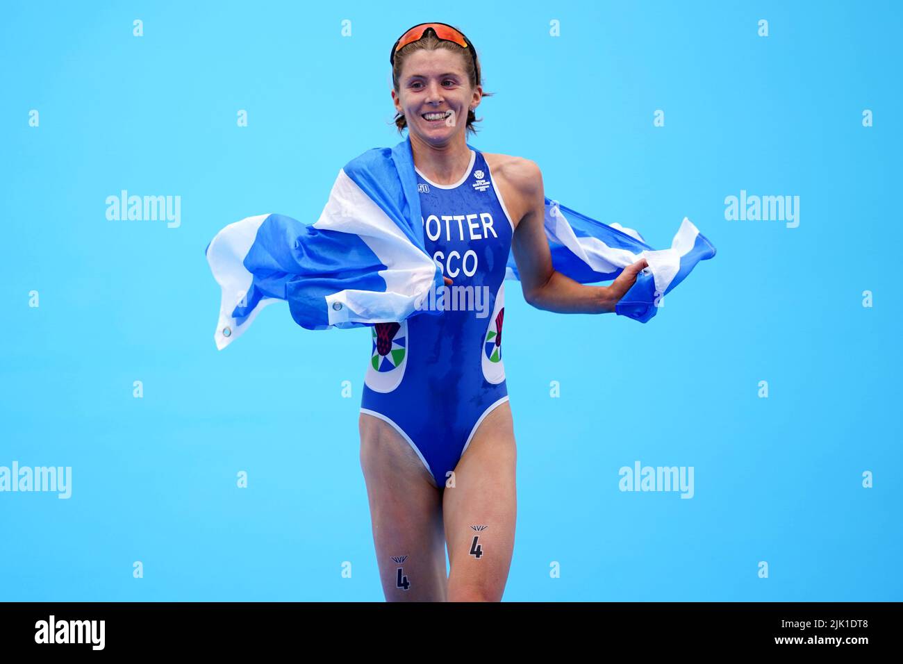 Scotland's Beth Potter celebrates crossing the line in third during the