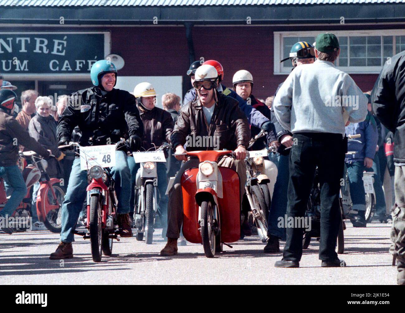 Idel happy faces at the start of a moped rally in Motala harbor, Sweden. Stock Photo