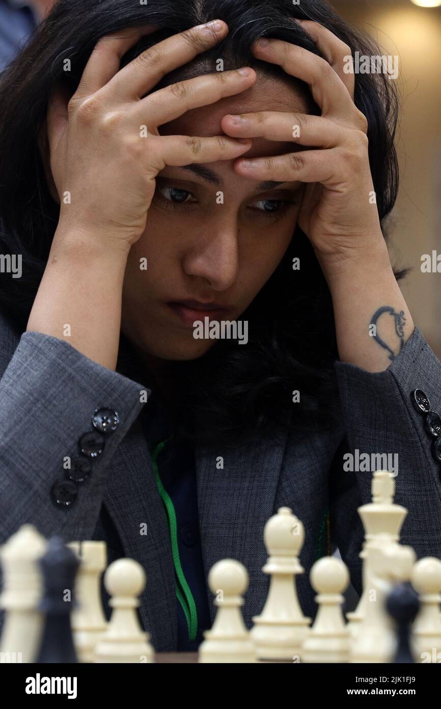 Chennai, Tamil Nadu, India. 29th July, 2022. A chess player gestures prior  the next move during the first round of the 44th Chess Olympiad in Chennai.  The total number of participants is