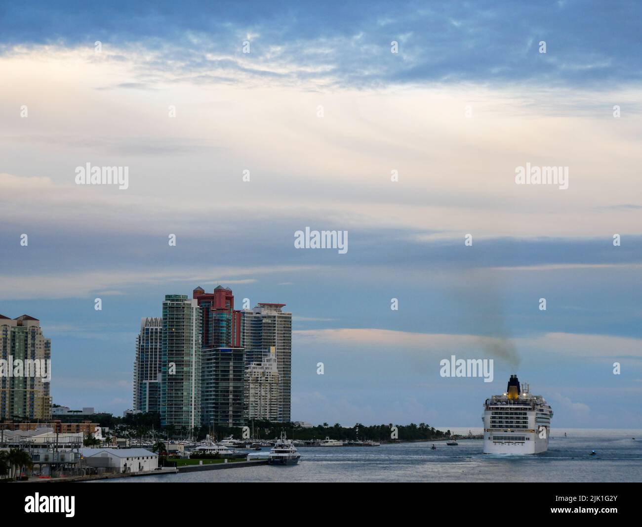 Ship cruise leaving port of Miami at dusk Stock Photo - Alamy