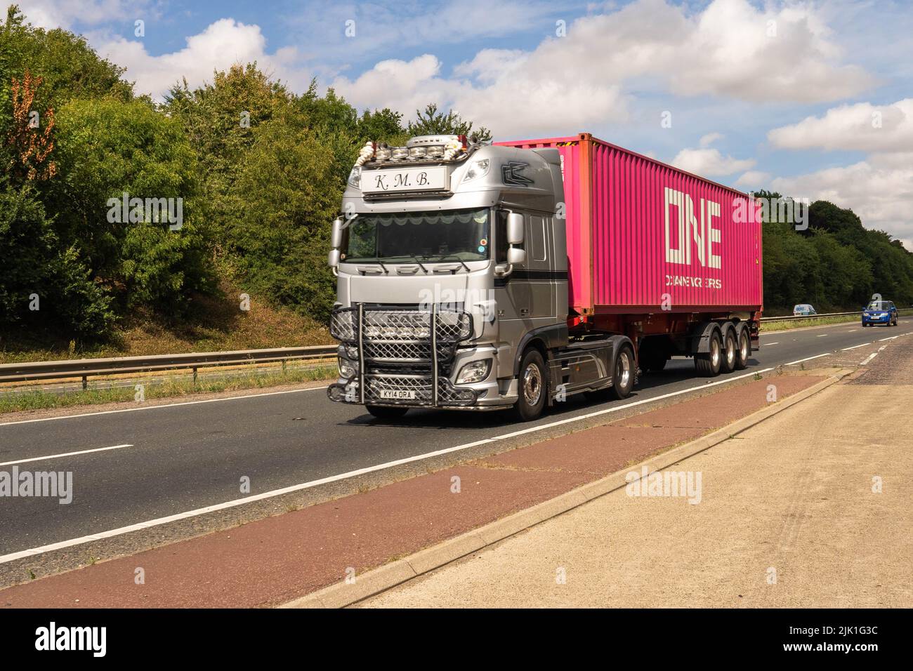 Daf articulated truck carrying a large container on its trailer Stock Photo