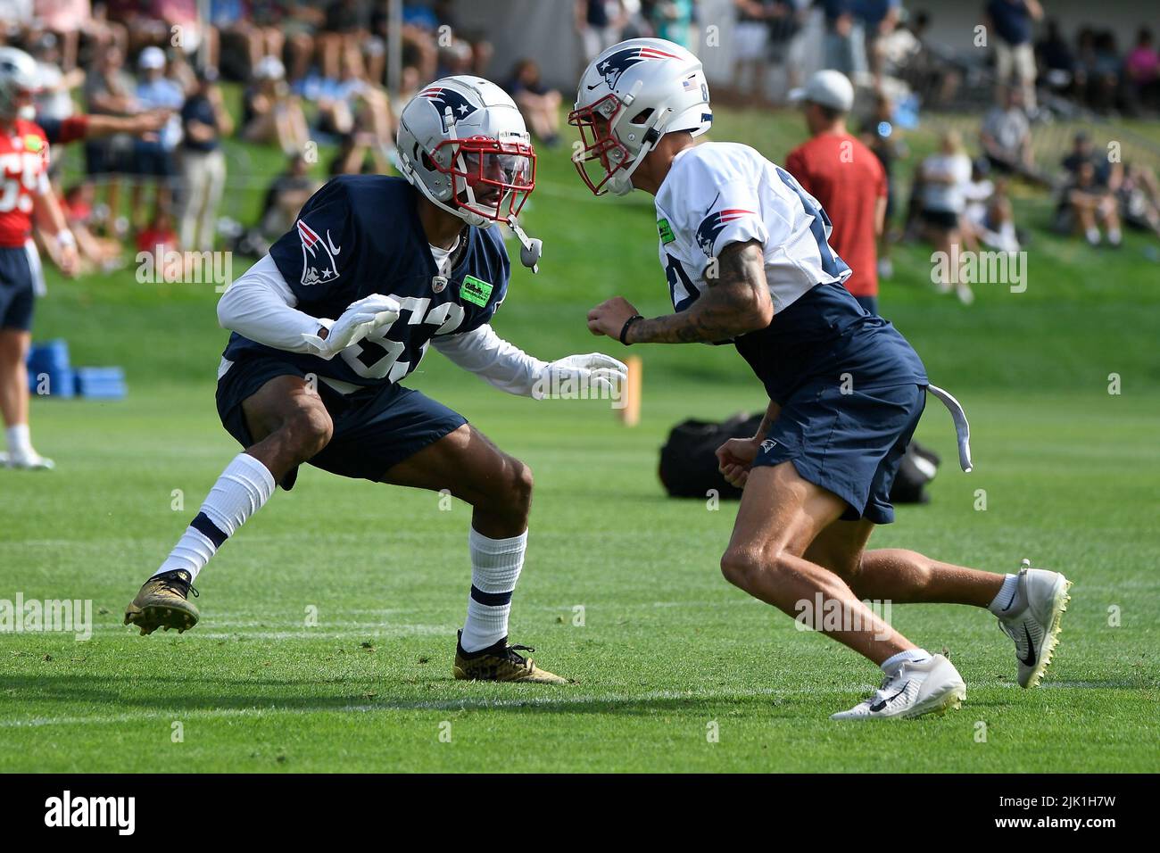 July 29, 2022; Foxborough, MA, USA; New England Patriots defensive back  Jack Jones (53) covers wide receiver Tre Nixon (82) at the Patriots  training camp held on the practice fields at Gillette