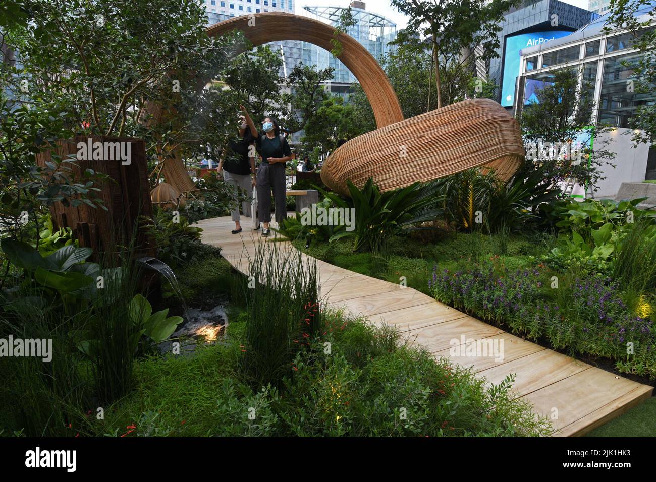 Singapore. 29th July, 2022. People view the participating works of the Show Garden competition, as part of the media preview of the Singapore Garden Festival in Singapore on July 29, 2022. The Singapore Garden Festival will be held from July 30 to Aug. 7. Credit: Then Chih Wey/Xinhua/Alamy Live News Stock Photo