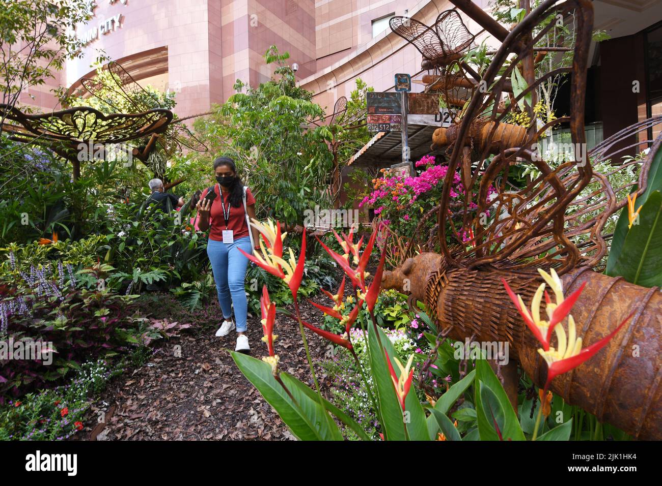 Singapore. 29th July, 2022. People view participating works of the Show Garden competition, as part of the media preview of the Singapore Garden Festival in Singapore on July 29, 2022. The Singapore Garden Festival will be held from July 30 to Aug. 7. Credit: Then Chih Wey/Xinhua/Alamy Live News Stock Photo