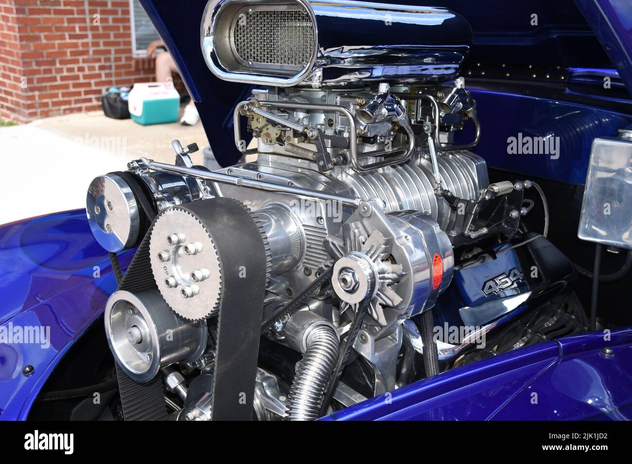 A 454 Supercharged Engine in a Willys Restomod on display at a car show. Stock Photo