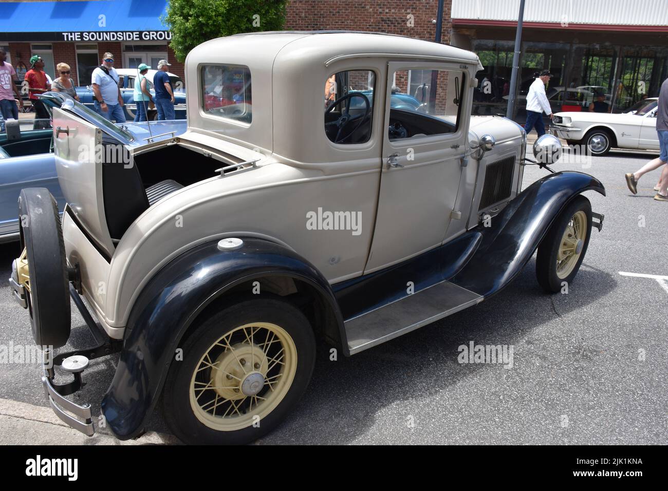 A 1930 Ford Model A with a Rumble Seat in the rear on display at a car show. Stock Photo