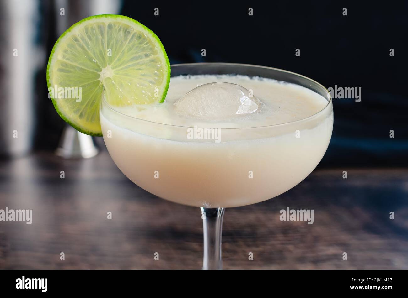 White Chocolate Gimlet Gin Cocktail with Ice Sphere Cocktail made with