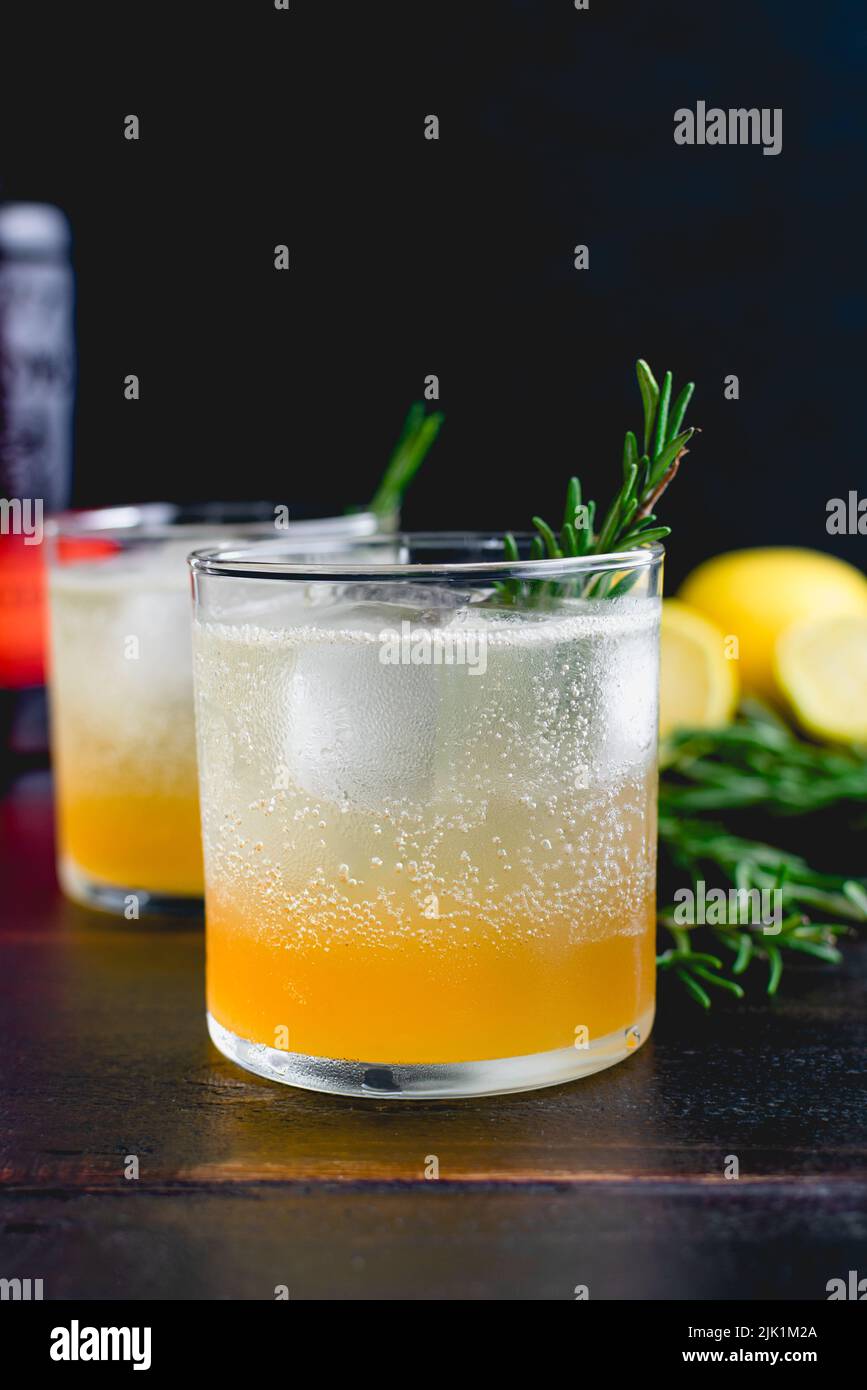 Sparkling RosemaryLemon Bourbon Cocktail American whiskey cocktails served over ice with a