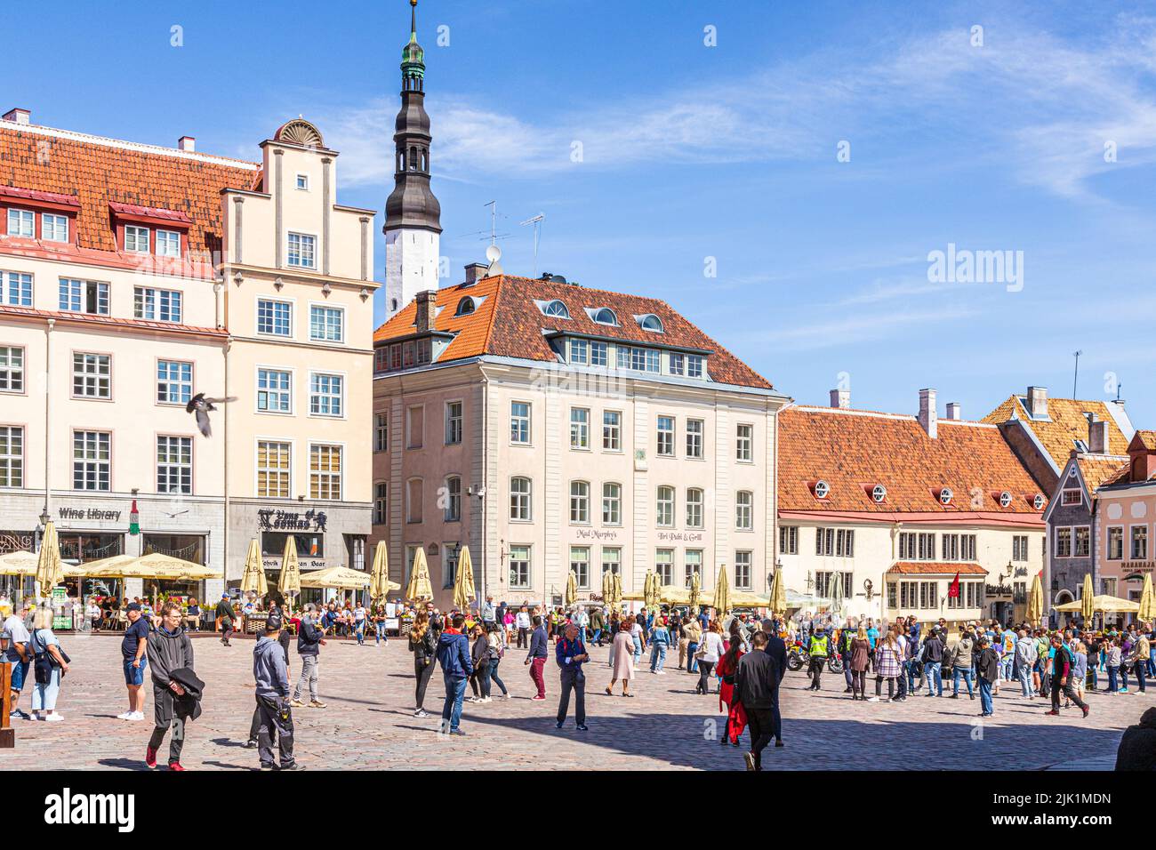 The bustling Town Hall Square in the Old Town of Tallinn the capital city of Estonia Stock Photo