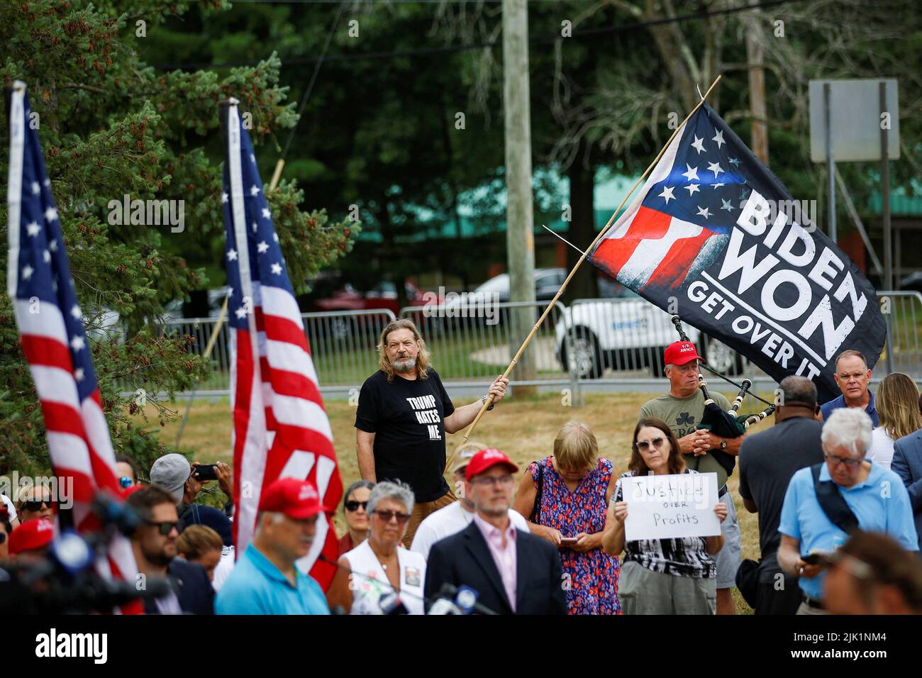 Family members and survivors from the organization 9/11 Justice protest against the Saudi Arabian-funded golf series and its tournament being held at the Trump National Golf Club in Bedminster, New Jersey, U.S., July 29, 2022. REUTERS/Eduardo Munoz Stock Photo