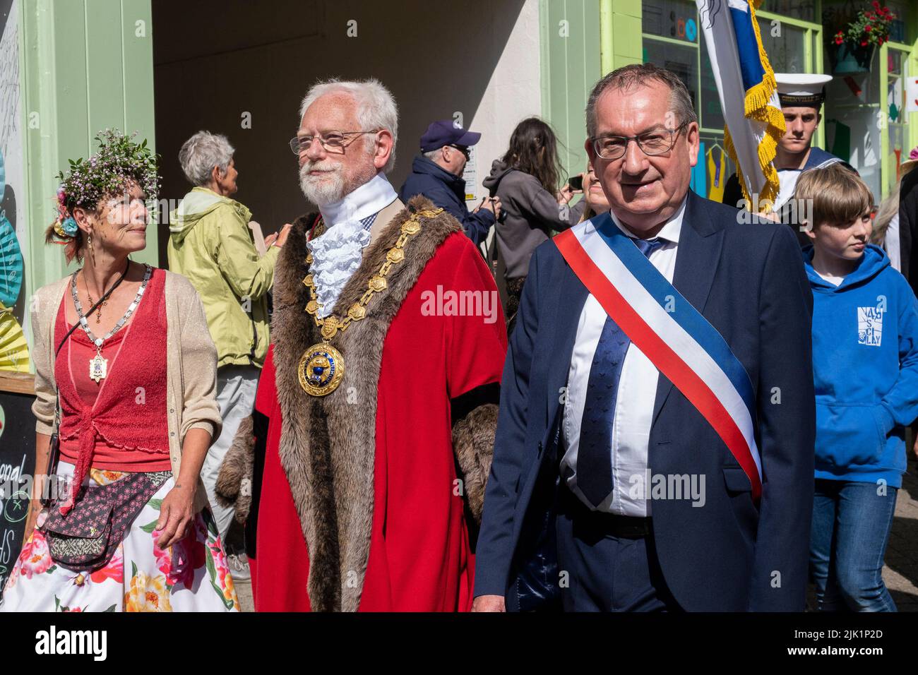 Mayor of Penzance Jonathan How accompanied by his consort Lesley Bradley and the mayor of Concarneau Marc Bigot leading the civic parade on Mazey Day Stock Photo