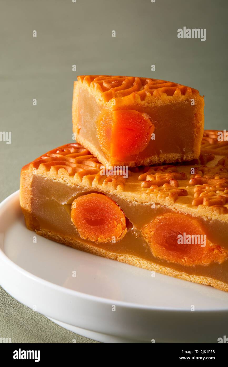 Cantonesestyle traditional egg yolk lotus paste mooncake for Chinese