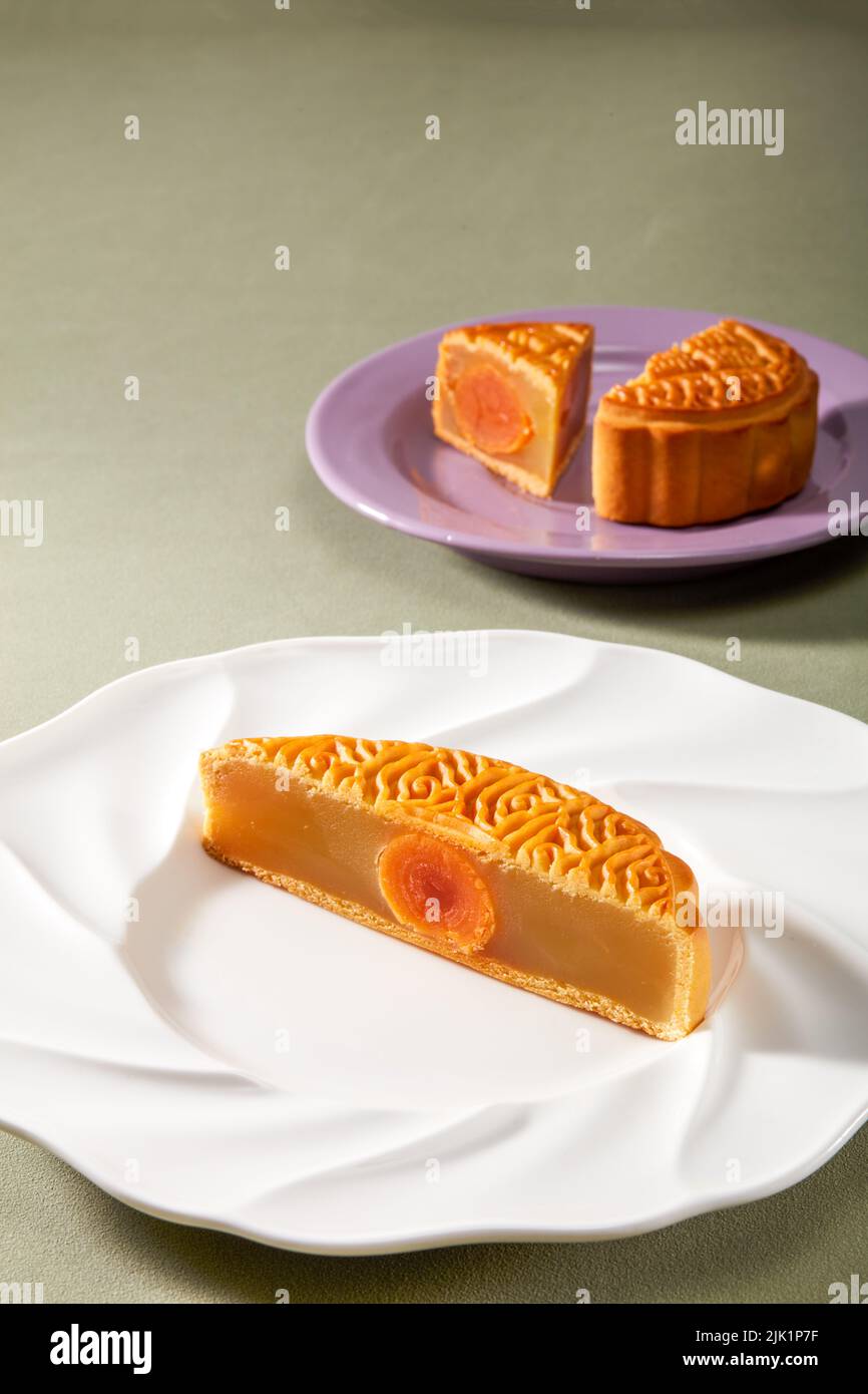 Cantonesestyle traditional egg yolk lotus paste mooncake for Chinese MidAutumn Festival
