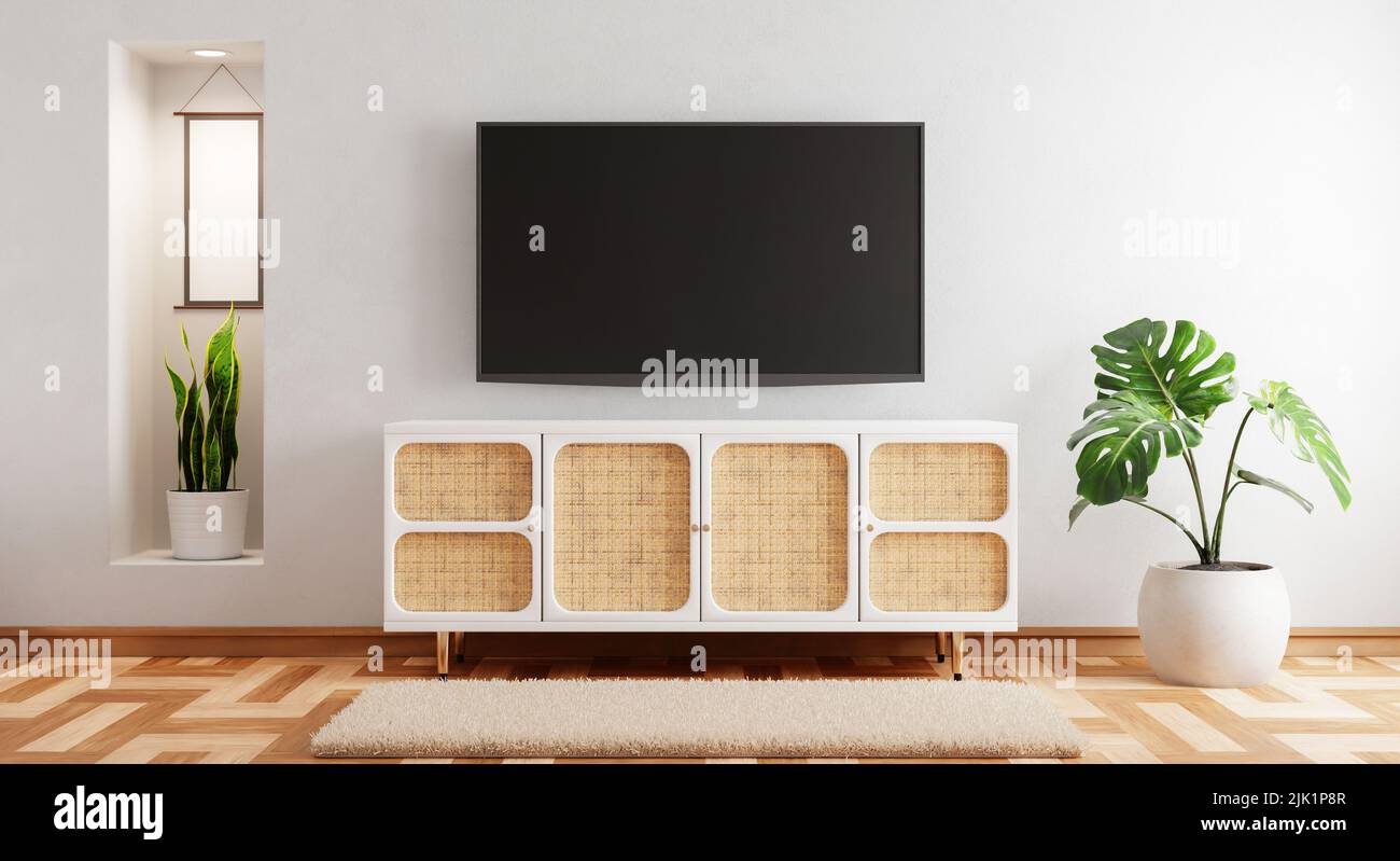 TV above wooden cabinet in modern empty room with plants carpet on wooden background. Japanese style theme. Architecture and interior concept. 3D illu Stock Photo