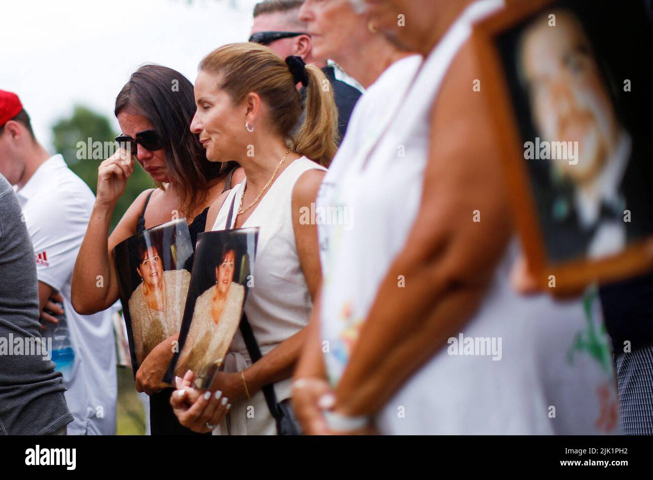 Family members and survivors from the organization 9/11 Justice attend a protest against the Saudi Arabian-funded golf series and its tournament being held at the Trump National Golf Club in Bedminster, New Jersey, U.S., July 29, 2022. REUTERS/Eduardo Munoz Stock Photo