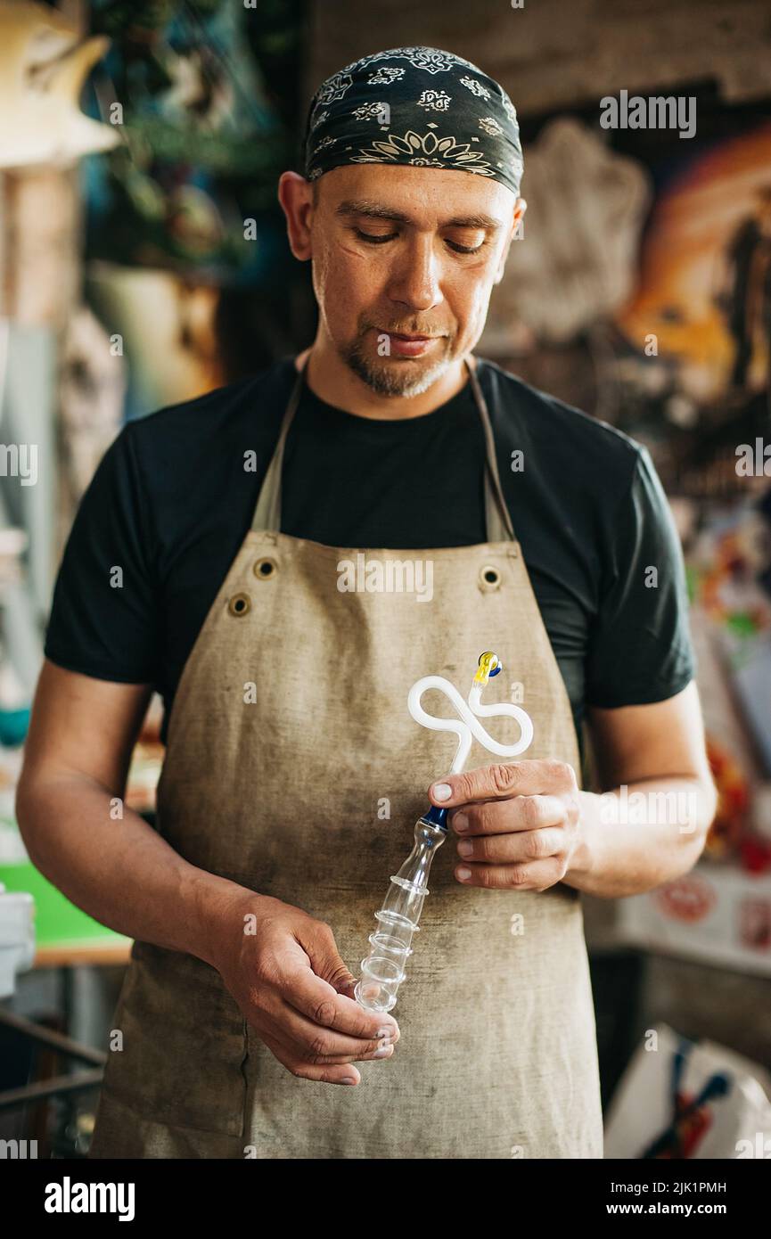 Glassblowing Burner with ready glass product. Production of