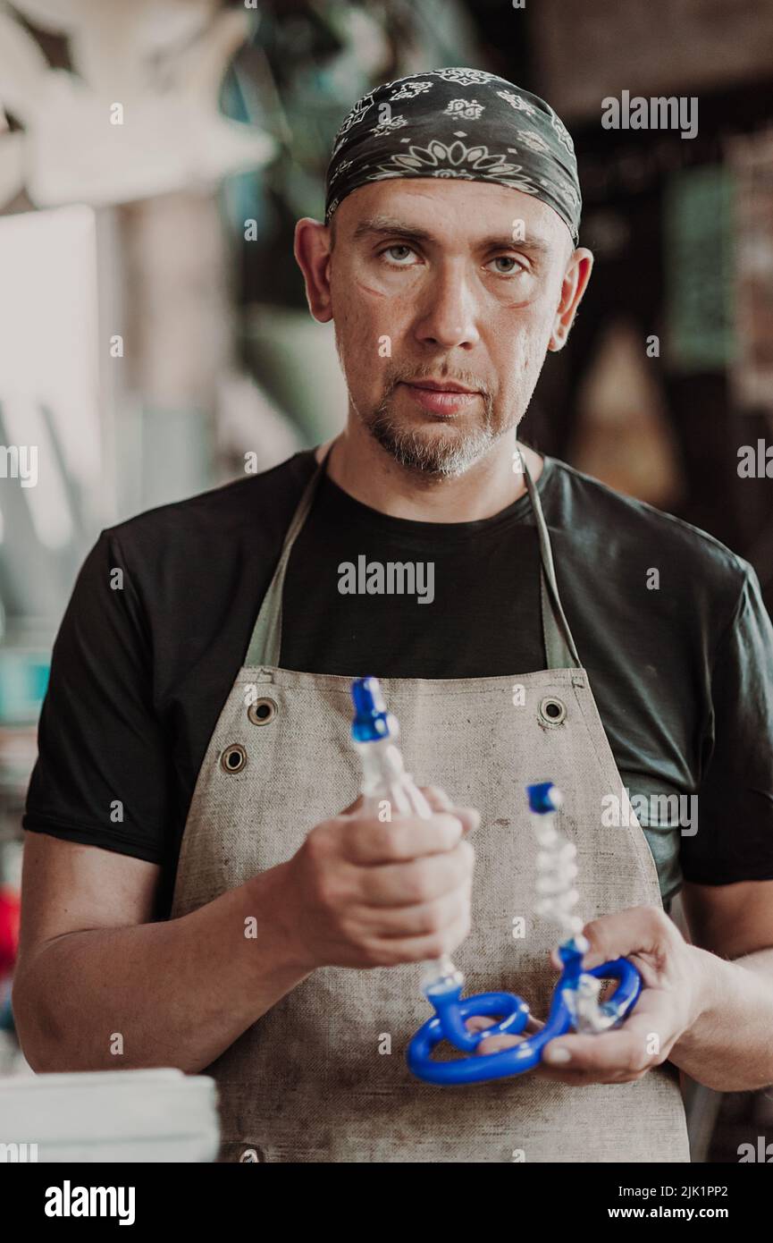 Glassblowing Burner with ready glass product. Production of