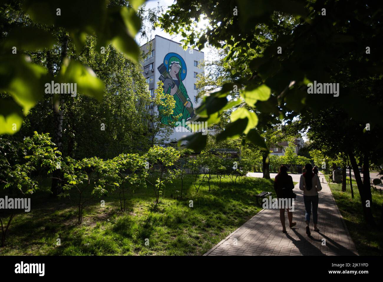 A mural known as Saint Javelina - Virgin Mary cradling a USA-made FGM-148 anti-tank weapon Javelin - on a living house wall in Kyiv. These missiles are among the arms being sent by Western allies to Ukrainian forces to aid in their fight against the Russian invaders. Javelin is widely considered as a symbol of Ukraine's defense. Stock Photo