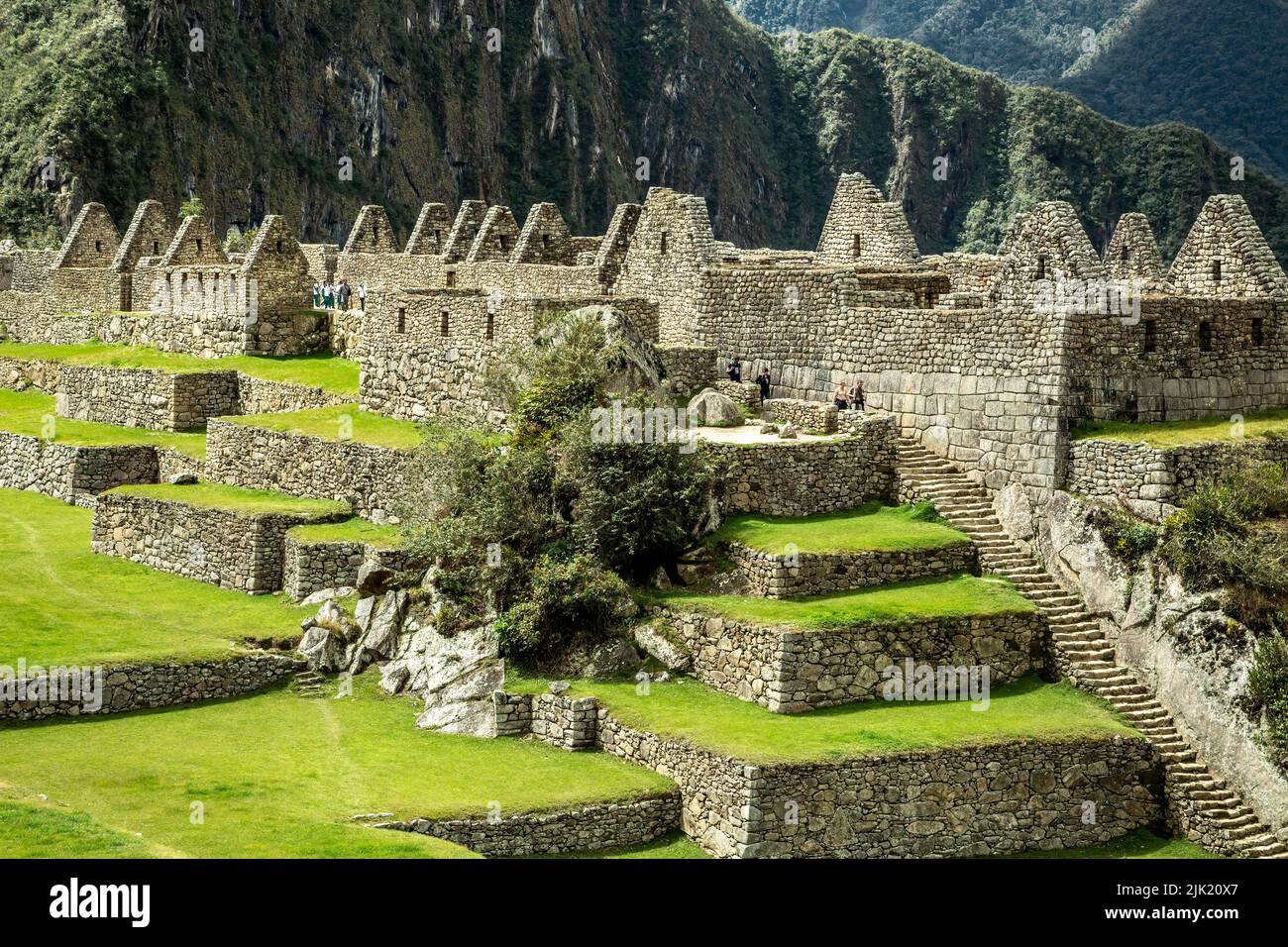 Stone buildings, Machu Picchu Inca ruins, near Aguas Calientes, aka Machu Picchu Pueblo, Cusco, Peru Stock Photo