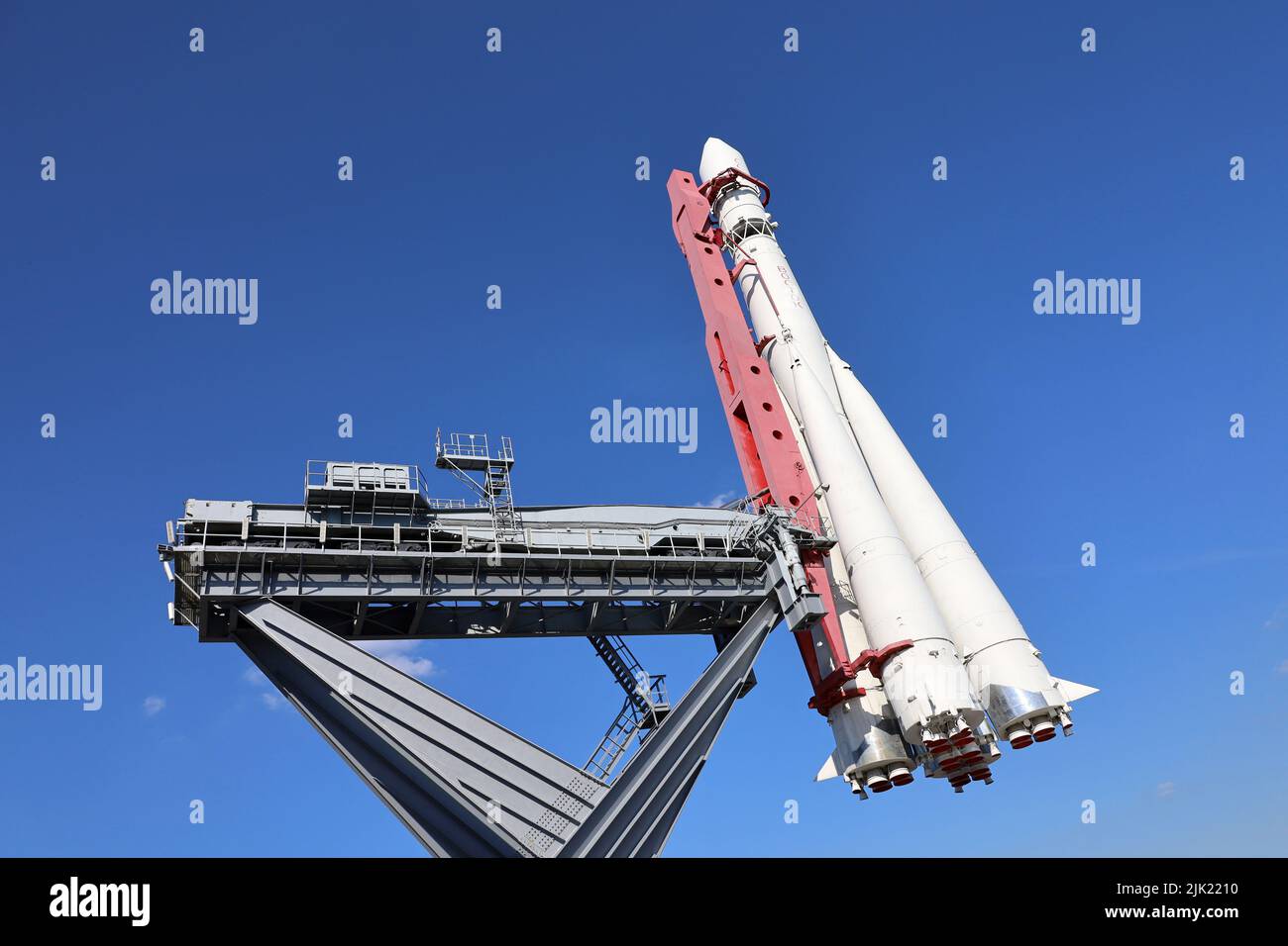 Russian spaceship Vostok 1, monument of the first soviet rocket at VDNH against blue sky. Concept of astronautics in USSR, history of Gagarin's flight Stock Photo