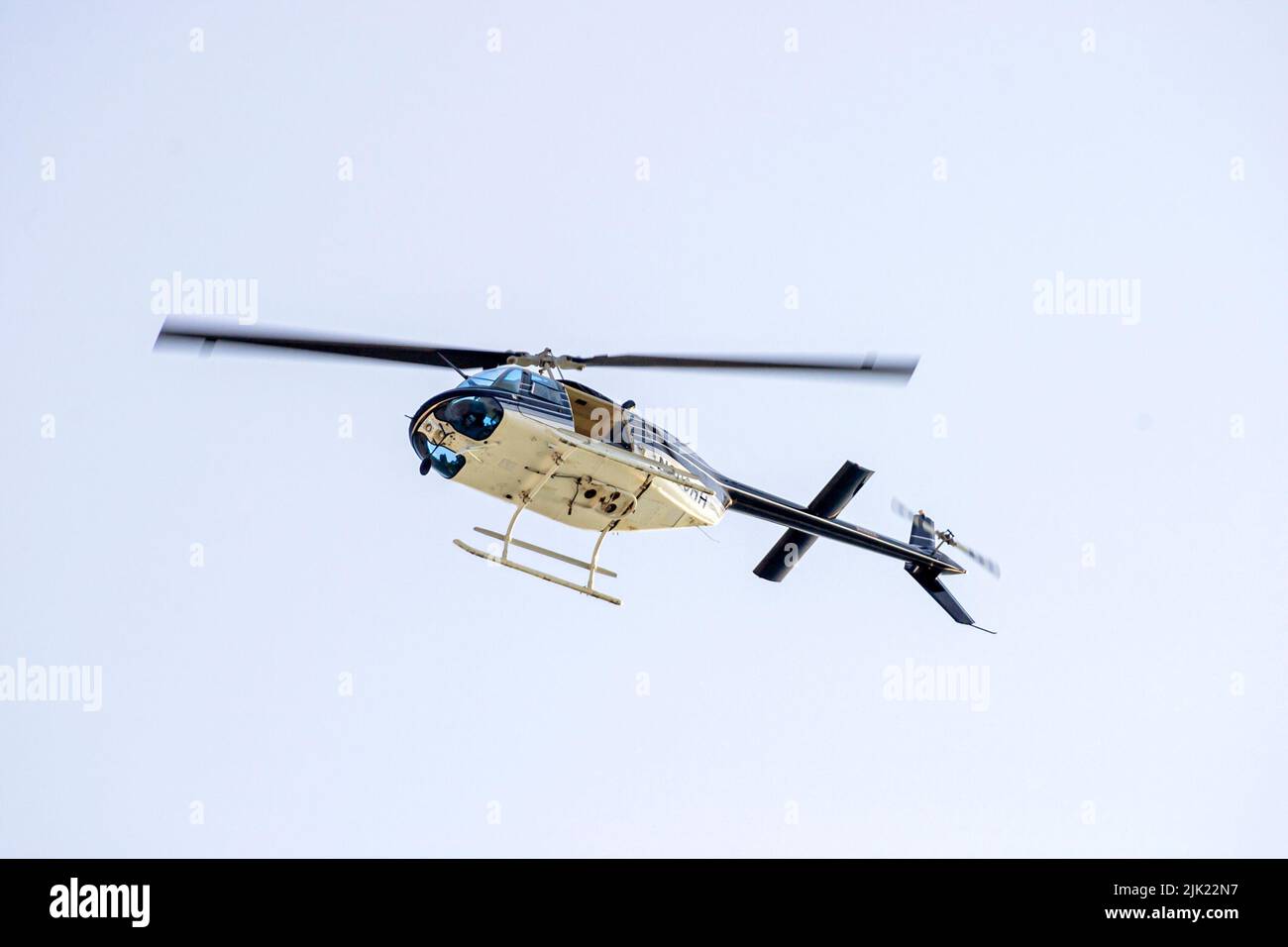 Miami Beach Florida helicopter inflight flying overhead Stock Photo