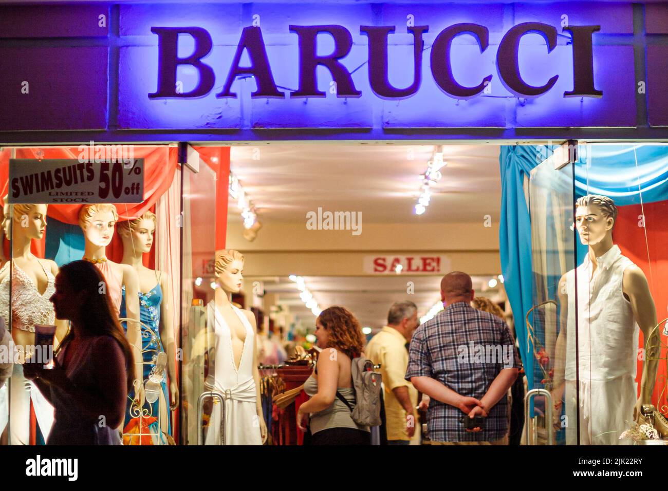 Miami Beach Florida,South Beach Ocean Drive,night nightlife evening shopping Barucci clothing fashion store business,outside neon sign entrance Stock Photo