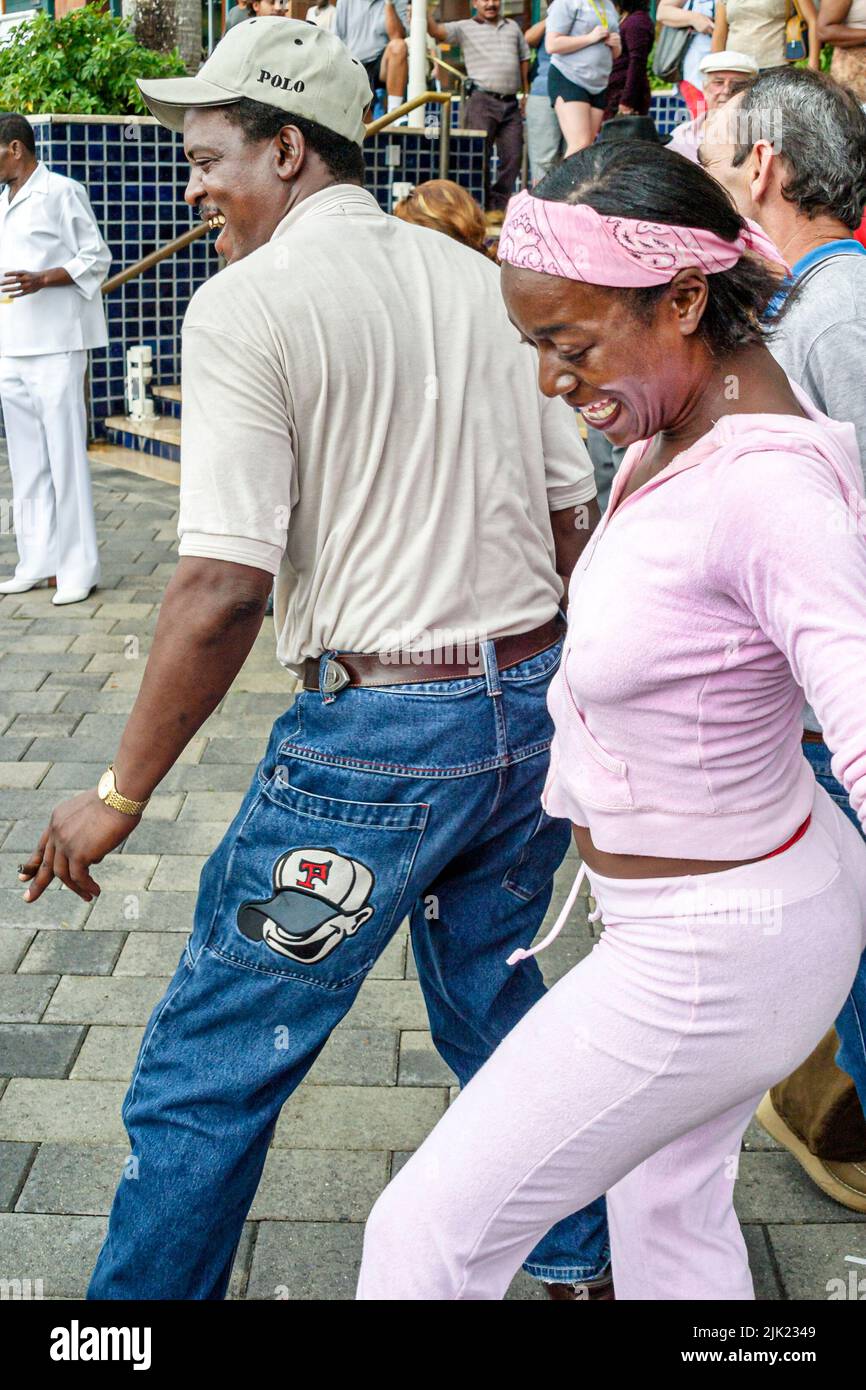 Miami Florida,Bayfront Marketplace shopping shoppers dance dancing,Black Blacks African minority couple man male woman female,people person Stock Photo