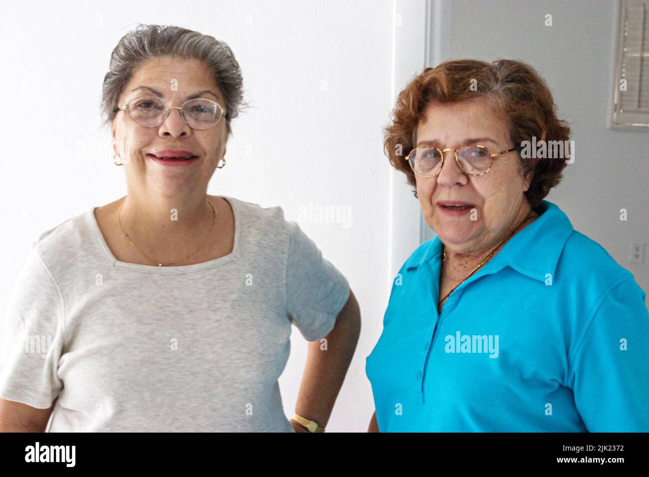 Miami Beach Florida,Hispanic Latin Latino ethnic immigrants minority Cuban,adult adults women female lady,condominium building neighbors,people Stock Photo