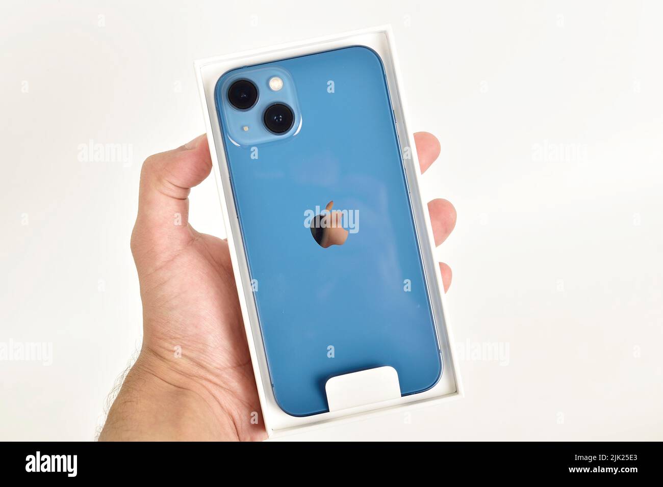 New Delhi, India - June 22, 2022: Unboxing iphone 13 blue color variant  isolated on white background Stock Photo - Alamy