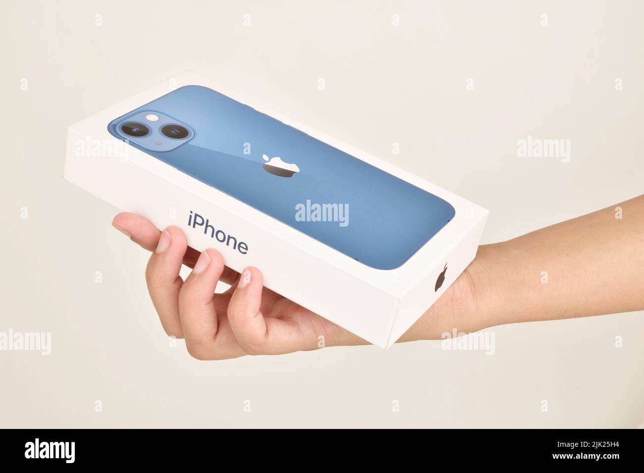 New Delhi, India -  June 22, 2022: apple iphone 13 box in hand Stock Photo