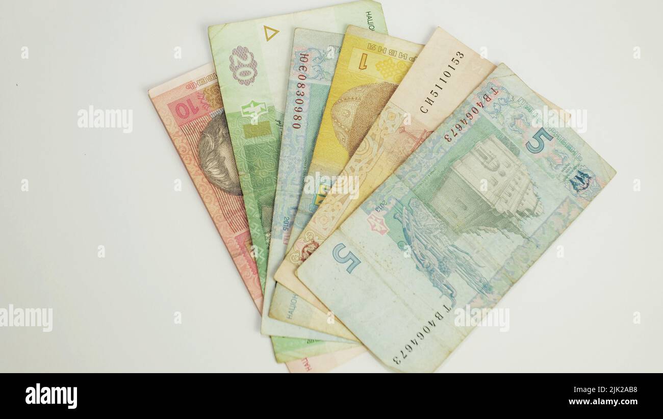 Ukrainian money background, on a white background Stock Photo