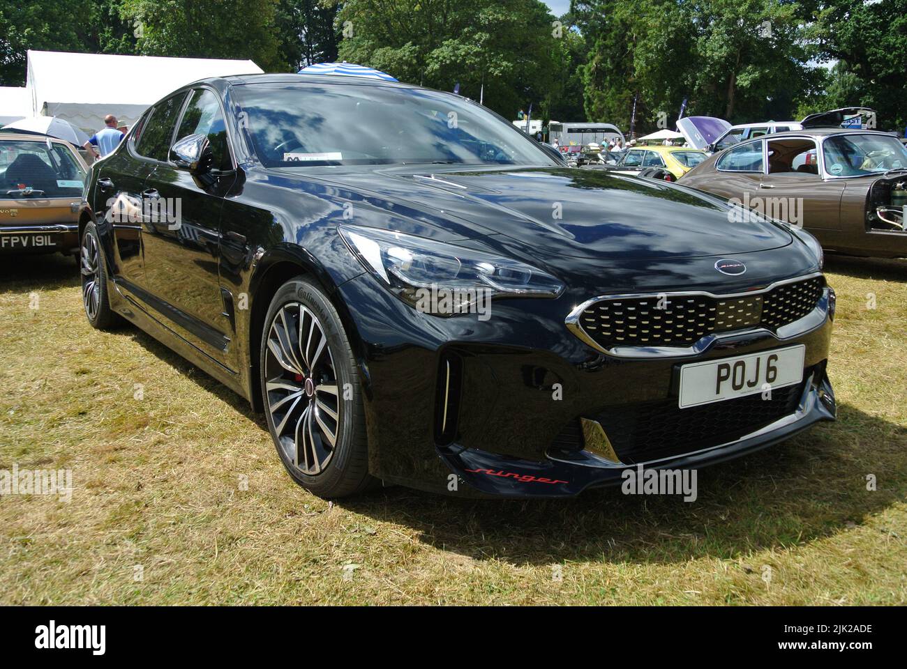 A 2019 Kia Stinger parked on display at the 47th Historic Vehicle Gathering classic car show A 2019 Kia Stinger parked on display at the 47th Historic Vehicle Gathering classic car show