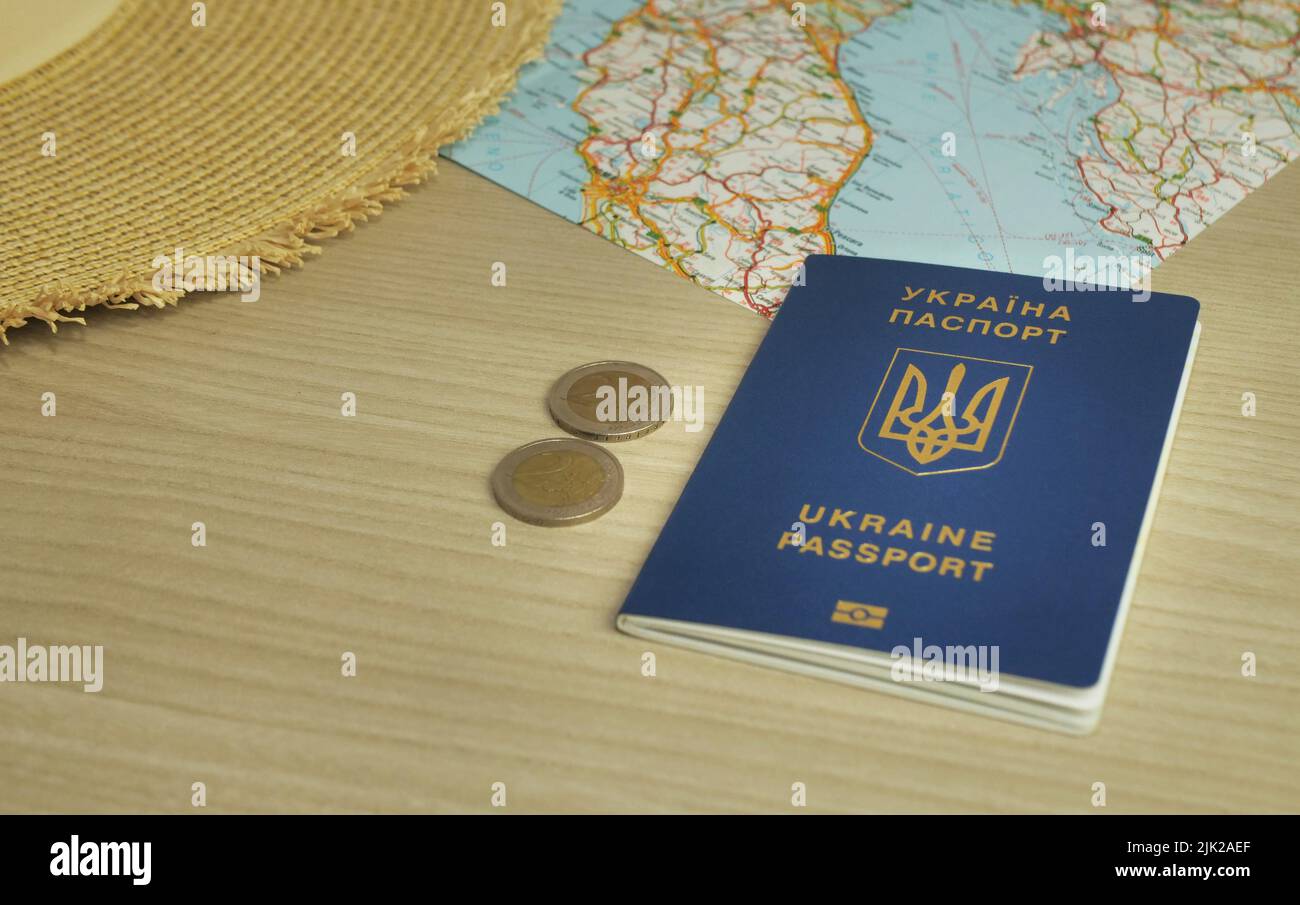 blue Ukrainian passport on the world map Stock Photo Alamy