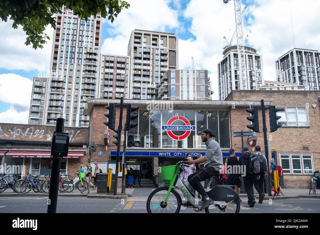 London, July 2022 White City Station with new residential buildings. A