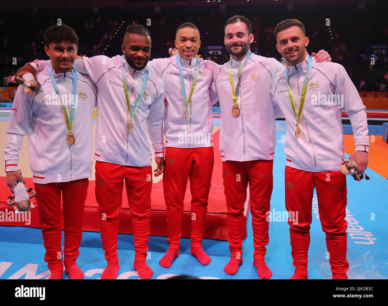 Birmingham, UK. 29th July 2022. The English team celebrate after winning Gold in the Gymnastics Mens team final during Day One of the Commonwealth Games, Birmingham. Credit: Paul Terry Photo/Alamy Live News Stock Photo