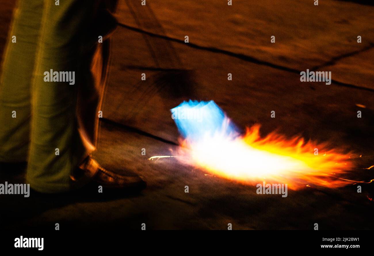 gas torch welds the roof ruberoid coating material Stock Photo