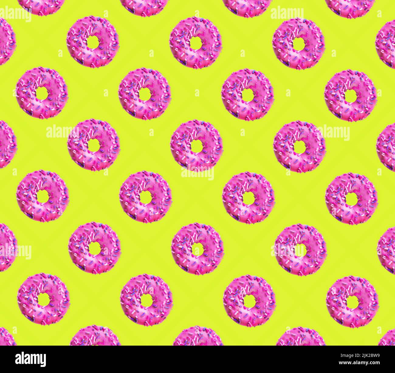 retro pattern with pink donuts on yellow Stock Photo