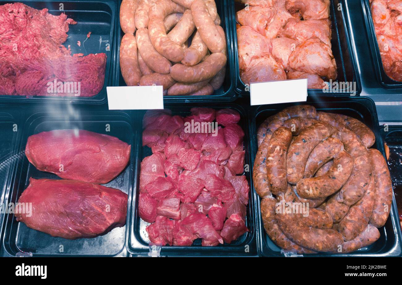 fresh meat and sausages in market Stock Photo