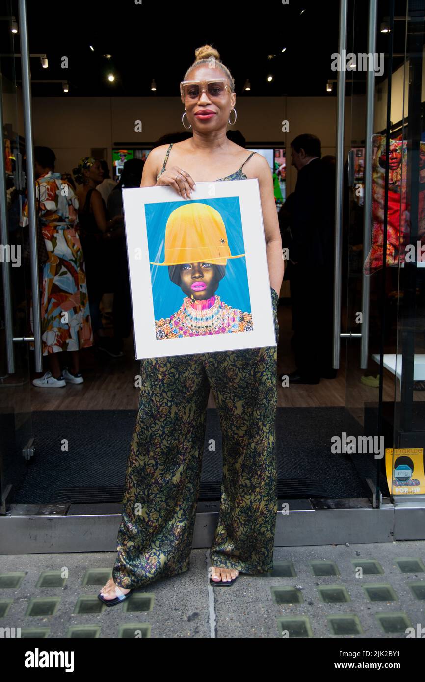 London, UK. 29th July, 2022. Caroline Chinakwe opens Pop Up Shop on Oxford Street, London. Caroline Chinakwe.Nigerian born and UK based artist Caroline Chinakwe opened her pop up shop at SOOK, 58 Oxford Street, London, W1D 1BH, with a reception attended by luminaries of the art world and actor Charles Venn of Eastenders and Casualty fame and his son, Marcel. The pop up shop is open from the 29th July to the 31st from 10:00 am to 8:00pm. Credit: Peter Hogan/Alamy Live News Stock Photo