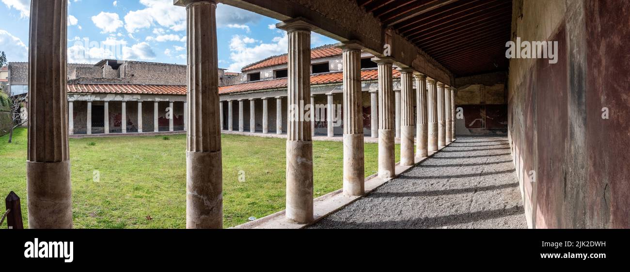 OPLONTIS, ITALY - MAY 03, 2022 - Garden and colonnade of the ancient Roman Villa Oplontis near Pompeii, Southern Italy Stock Photo