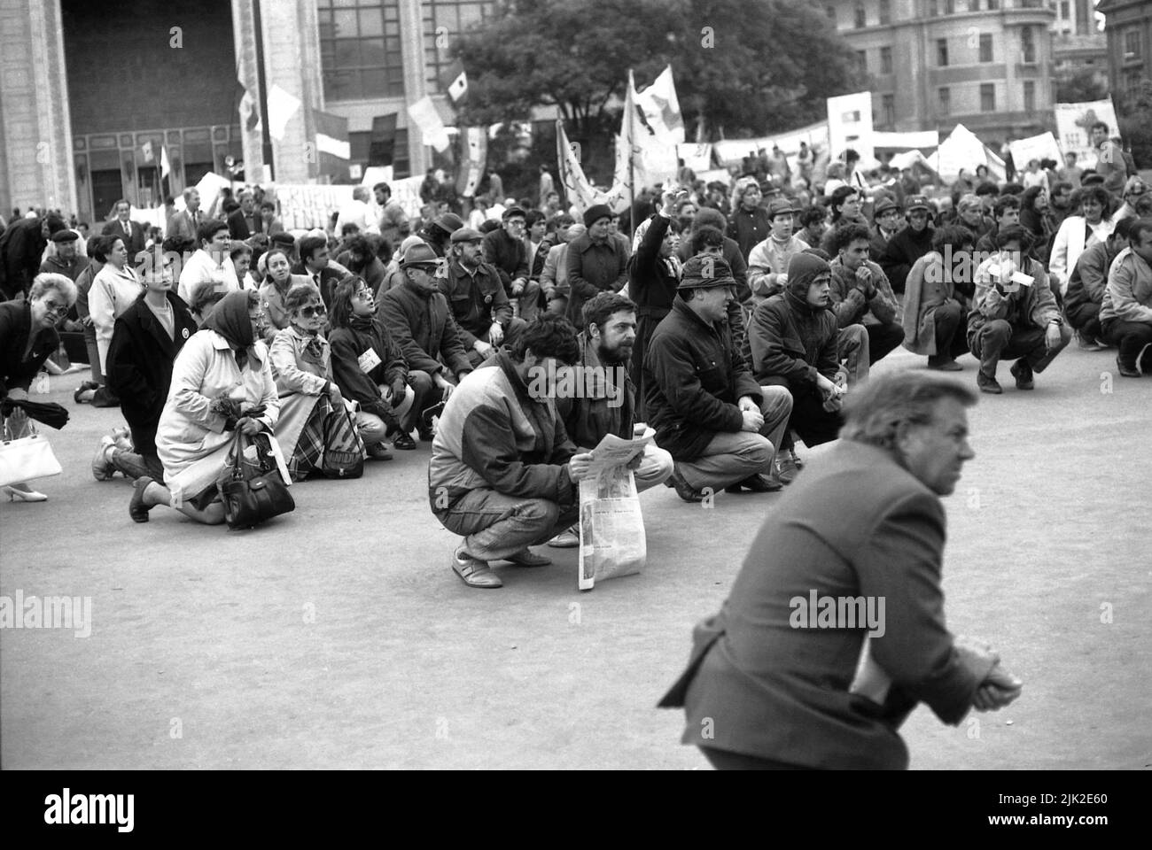 Bucharest, Romania, April 1990. People gathered in the University Square during 'Golaniada', a major anti-communism protest   following the Romanian Revolution of 1989. People were protesting the ex-communists that grabbed the power after the Revolution. The main demand was that no former party member would be allowed to run in the elections of May 20th. Stock Photo