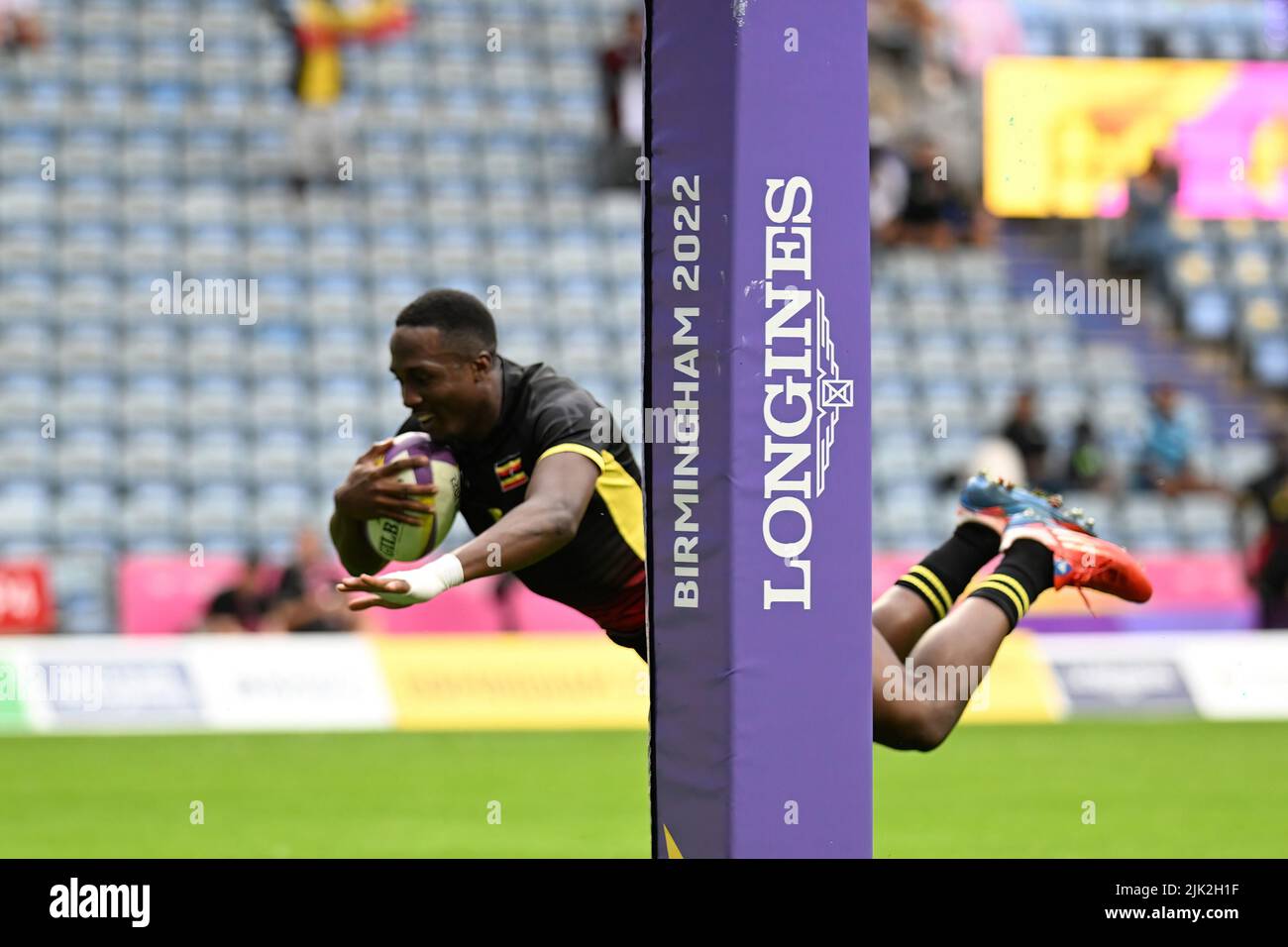 Desire Ayera of Uganda scores a try to take the lead against Australia during the Rugby Sevens at the Commonwealth Games at Coventry Stadium on Friday 29th July 2022