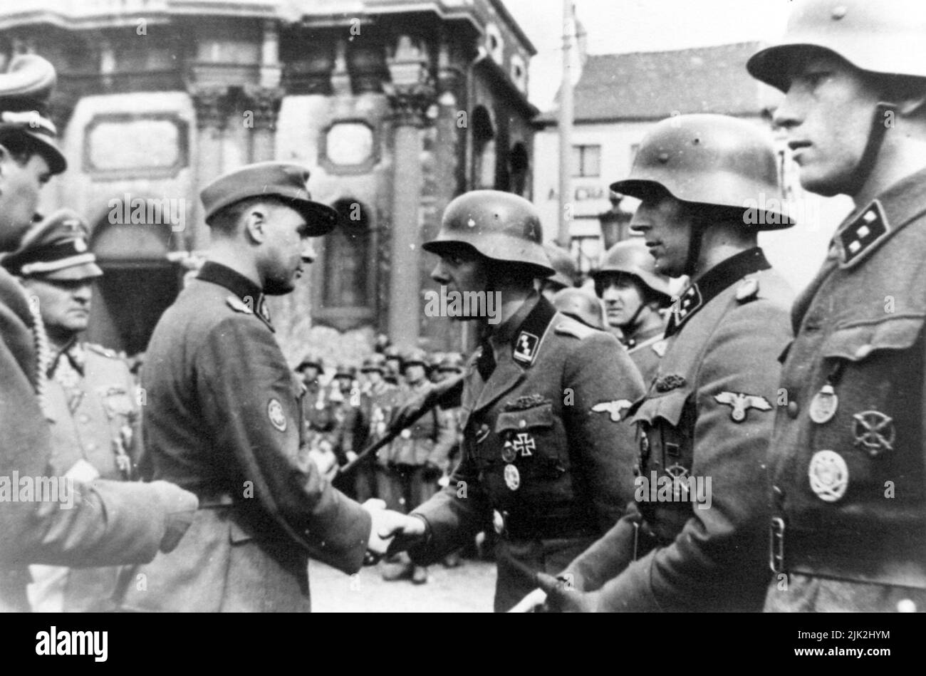 The Belgian nazi collaborator Leon Degrellle greeting Belgian members of the SS Walloon Legion at Charleroi in 1944 (5th SS Volunteer Sturmbrigade Wallonien), as SS Division of Belgian volunteers. Stock Photo
