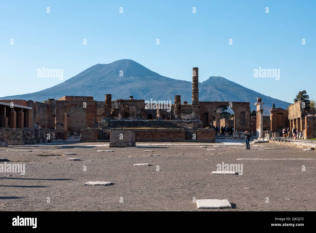 Iconic forum in the ancient city of Pompeii, Mount Vesuvius in the background, Southern Italy Stock Photo