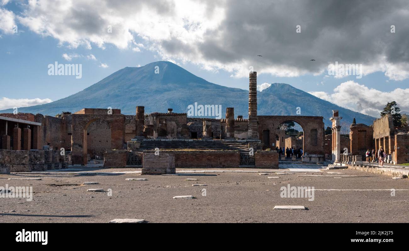 Iconic forum in the ancient city of Pompeii, Mount Vesuvius in the background, Italy Stock Photo