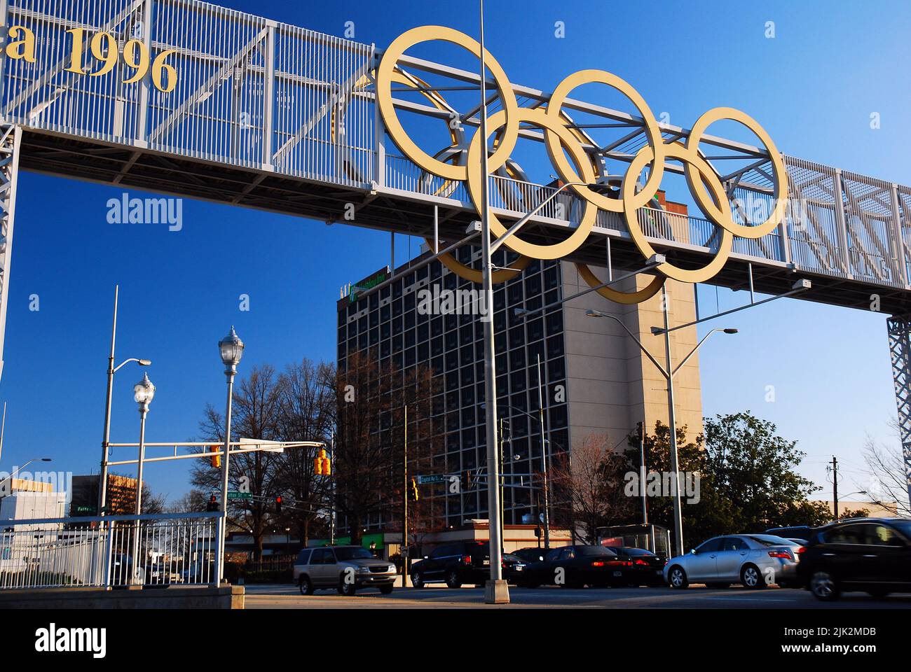 The Olympic rings hang over a busy street in Atlanta, a relic of when the city hosted the 1996 Games Stock Photo